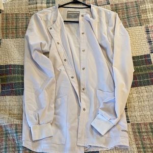 White Sketchers scrub jacket